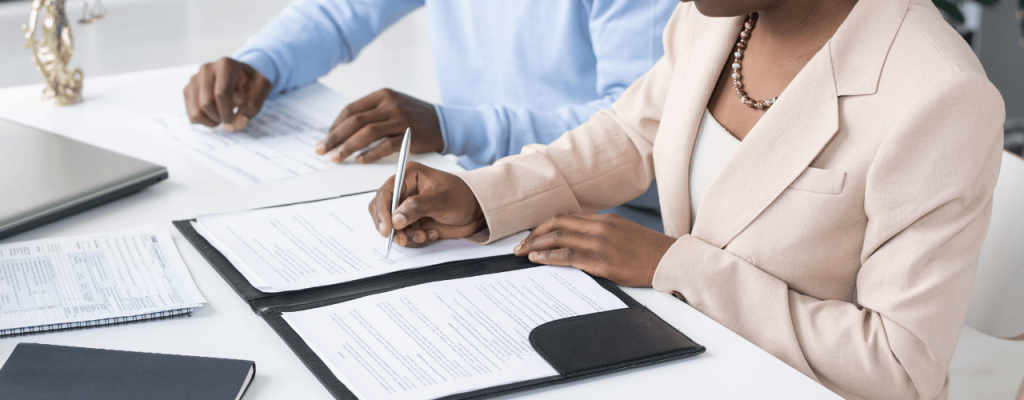 LEGALIZATION AND AUTHENTICATION OF DOCUMENTS IN NIGERIA Two people authenticating documents in nigeria